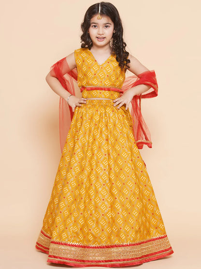 Girls Yellow Mustard Bandhej Printed Lace Work Lehanga,Choli With Dupatta.